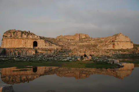 Theatre of Miletus mirrored in floodwater, evening light, Turkey — Nicolas Marincic