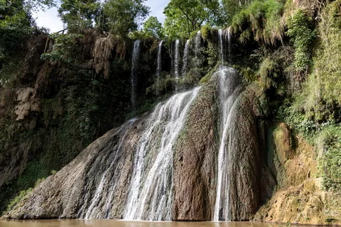 Waterfall over a rock face, Vietnam — Nicolas Marincic